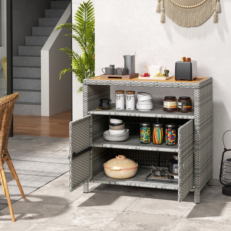 Rattan storage cabinet with acacia wood countertop, featuring a 2-door design for outdoor patio and poolside.